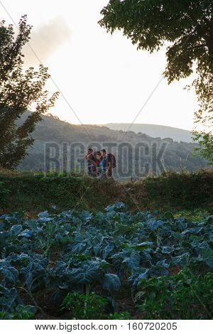 LA FABA SPAIN - AUGUST 09: Pilgrimns next to the cultivated garden on August 09 2016