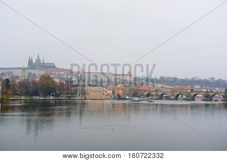 Panorama of an old Prague, bridges and embankment of Vitava river, Czechia
