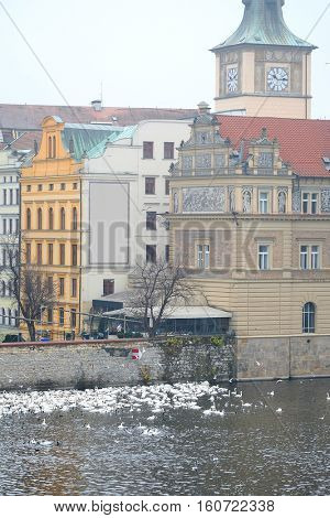 Panorama of an old Prague, bridges and embankment of Vitava river, Czechia