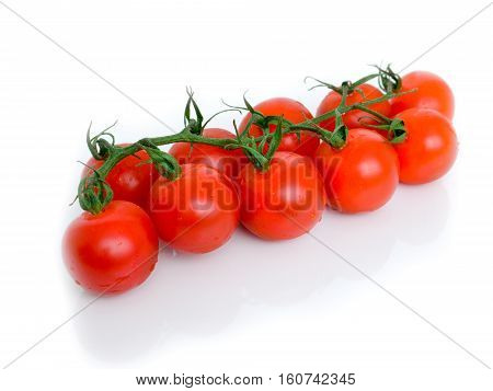 Ripe Fresh Cherry Tomatoes on Branch Isolated on White Background