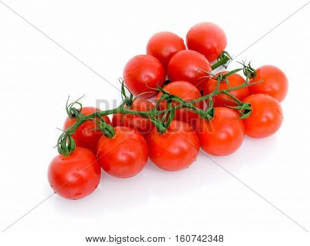 Ripe Fresh Cherry Tomatoes on Branch Isolated on White Background