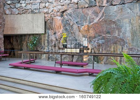 Helsinki, Finland - April 10, 2010:  Altar in the interior of Temppeliaukio Church (Church of the Rock) on Lutherinkatu. Was built directly into solid rock and opened in 1969