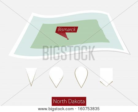 Curved Paper Map Of North Dakota State With Capital Bismarck On Gray Background. Four Different Map