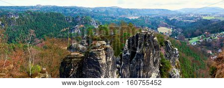 Panoramic view of Bastei. It is a rock formation towering 194 metres above the Elbe River in the Elbe Sandstone Mountains of Germany major landmark of the Saxon Switzerland National Park. Germany