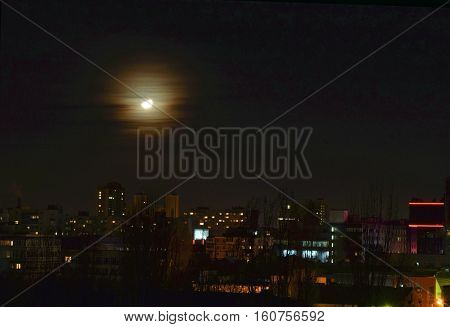 The moon and the landscape of winter city.