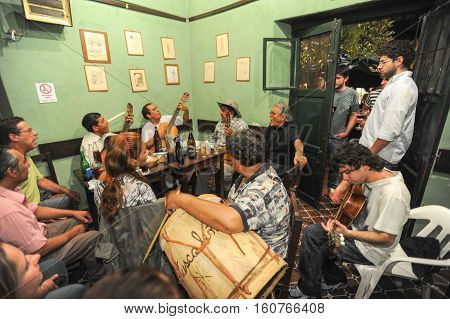 Salta Argentina - 21 February 2011 People listening at a music entertainment at the bar of La Casona on Salta Argentina