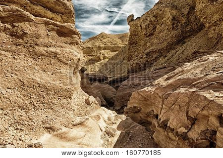Landscape of the Red Canyon in the Eilat Mountains Israel. (HDR image with black gond effect)