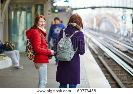 Two Young Tourist In Parisian Subway