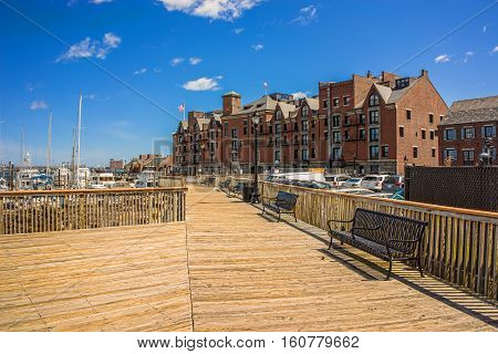 Long Wharf And Customhouse Block With Ferries In Charles River