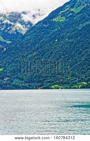 Sailboat In Lake Brienz And Brienzer Rothorn Mountain Bern Swiss
