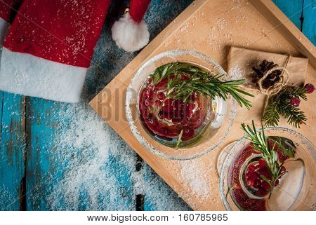 Christmas Cocktail With Cranberries And Rosemary