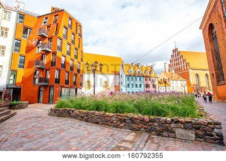 View on the old town's square near saint Peter cathedral in Riga, Latvia