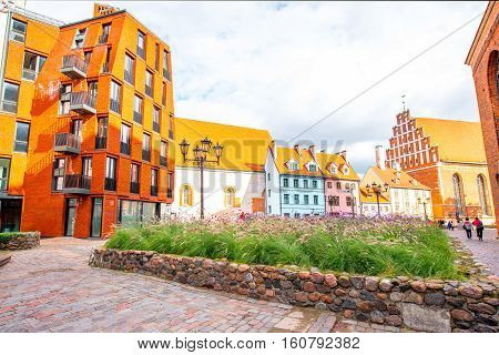 View on the old town's square near saint Peter cathedral in Riga, Latvia