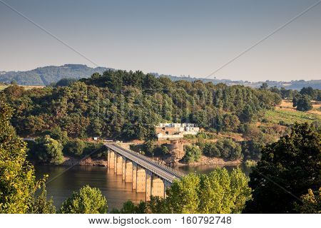 Roman bridge over the Minho River in Portomarin Spain