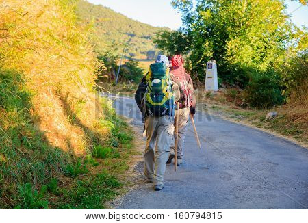 GALICIA SPAIN - AUGUST 10: Pilgrimns along the way of St. James on 10 2016