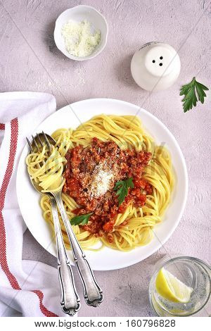 Spaghetti Bolognese In A White Plate.top View.