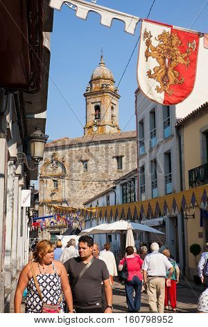 MELIDE SPAIN - AUGUST 14: People walking in the town on August 14 2016