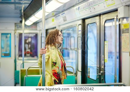 Young Beautiful Parisian Woman In Subway