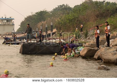 CHIANG RAITHAILAND-APR 32016 : Lifeguard and Triathlon athlete sporter in Golden Triangle Triathlon on April 3 2016 in Chiang sean district Chiang raiThailand.