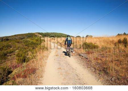 RABANAL SPAIN - AUGUST 05: Pilgrimn biker along the way of St. James on August 05 2016