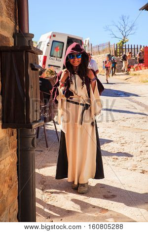 EL ACEBO DE SAN MIGUEL SPAIN - AUGUST 05: Girl with cassock during the way of St. James on August 05 2016