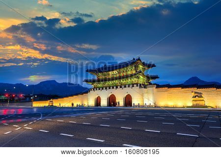 Geyongbokgung Palace and car light at sunset in Seoul South Korea.