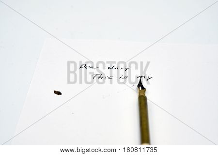 Feather Pen On The Beginning Of A Letter