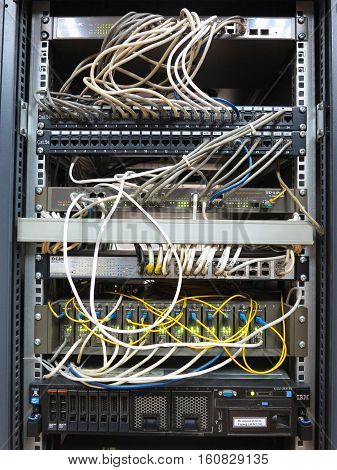 06.12.2016 MoldovaChisinau: Server rack with internet patch cord cables connected to panel in server room