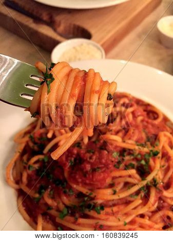 Spaghetti on fork and parmesan mobile stock