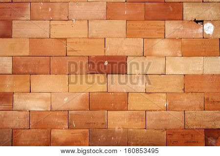 Detail of brown tile wall texture background