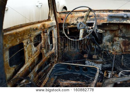 Salon of the burnt car concept riots