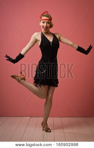 Pretty Actress In Black Retro Dress Dancing Charleston