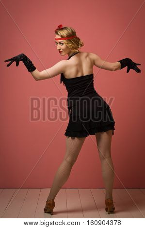 Pretty Actress In Black Retro Dress Dancing Charleston