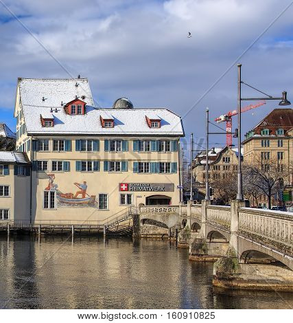 Zurich, Switzerland - 1 February, 2015: view along the Rudolf Brun bridge, historic buildings in the background. Zurich is the largest city in Switzerland and the capital of the Swiss Canton of Zurich.