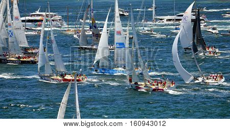 Sydney Australia - December 26 2013. Participiant Yachts approaching South Head. The Sydney to Hobart Yacht Race is an annual event starting in Sydney on Boxing Day and finishing in Hobart.