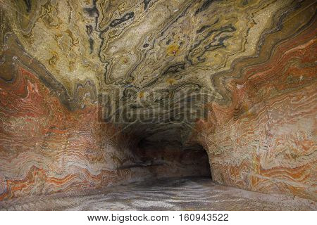 Abandoned varicoloured salt mine shaft tunnel carnallite