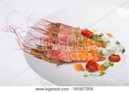 langoustine prawns grilled pink color white background