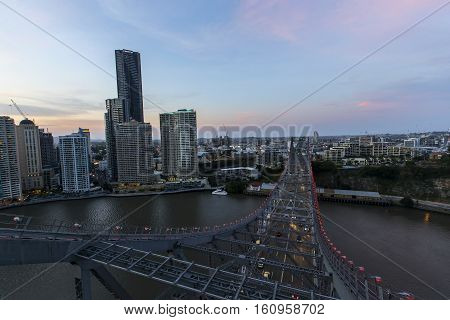 BRISBANE, AUSTRALIA - December 5 2016: Colourful sunset looking down at the night traffic, from the top of Brisbane Story Bridge