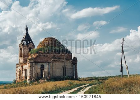destroyed, ruined, abandoned church or manor, mansion in Russian village