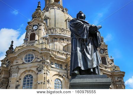 Frauenkirche (Our Lady church) and statue Martin Luther in the center of old town in Dresden Germany