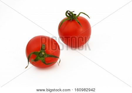 On white & copy space fresh healthy cherry tomatoes stock pictures