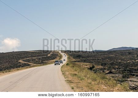 Oman Salalah - Local arab people talking during Jeep Tour at dofar Mountains Sultanate