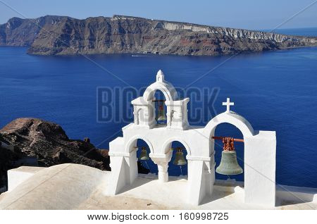 view to santorini caldera. white orthodox church in Santorini island, Greece