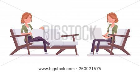 Young Red-haired Woman Sitting And Resting, Working With Laptop. Caucasian Attractive Girl With Ging