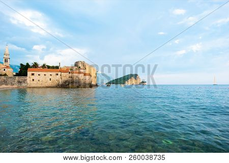 Bell Tower Of Sveti Ivana Cathedral And Adriatic Sea In Budva, Montenegro