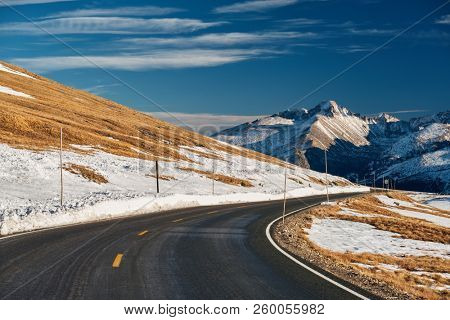 Trail Ridge Road, the highest (12,183 feet) continuous highway in the USA in high alpine tundra with rocks and mountains at autumn. Rocky Mountain National Park in Colorado, USA. 