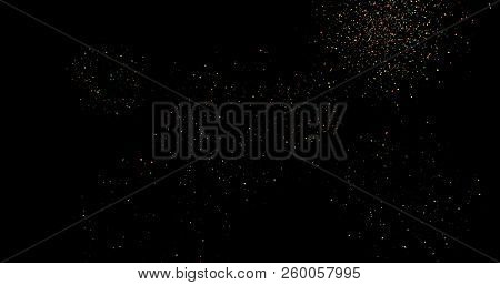 Flying Dust Particles On A Black Background
