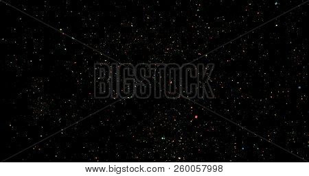 Flying Dust Particles On A Black Background