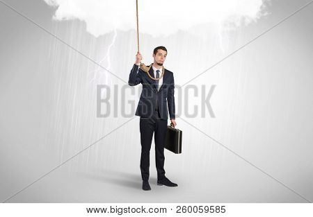 Young businessman trying to suicide with pointing hands concept
