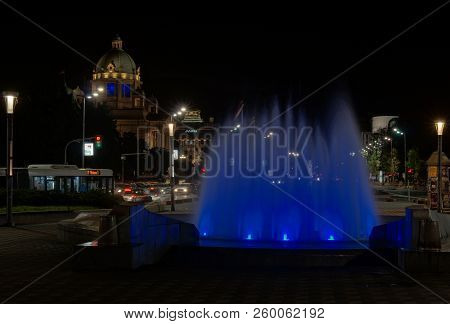 Belgrade, Serbia - May 04, 2018: Blue Light Illuminated Fountain At Trg Nikole Pasica Square At Nigh